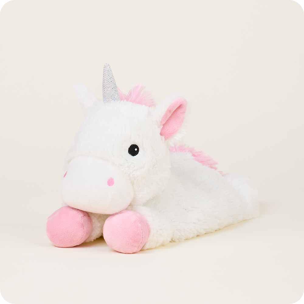Laying down Unicorn Warmies